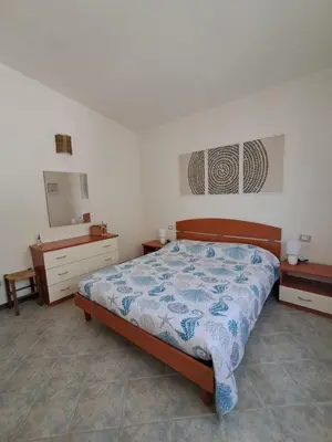 Letto o letti in una camera di Sa Domu