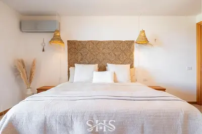 Letto o letti in una camera di Villa D'Angeli