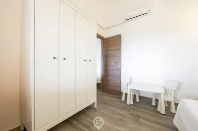 Letto o letti in una camera di Villa Nai Blue Horizon