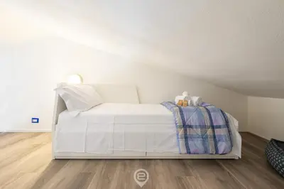 Letto o letti in una camera di Villa Nai Blue Horizon