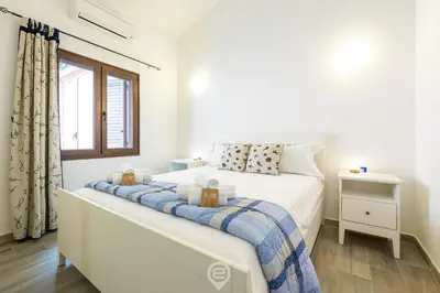 Letto o letti in una camera di Villa Nai Blue Horizon