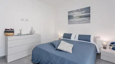 Letto o letti in una camera di Casa Camu