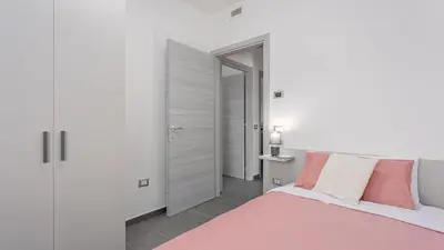 Letto o letti in una camera di Casa Camu