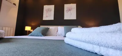 Letto o letti in una camera di NüMa Apartment