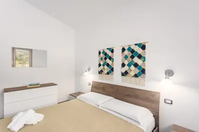 Letto o letti in una camera di Podere Is Tres Fradis