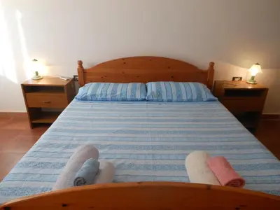 Letto o letti in una camera di La Tavernetta