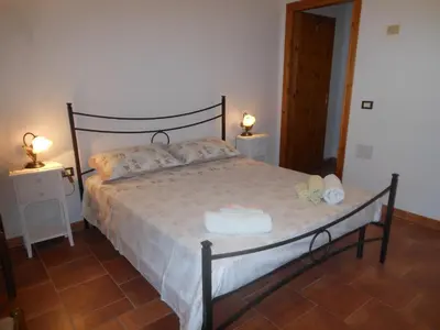 Letto o letti in una camera di La Tavernetta
