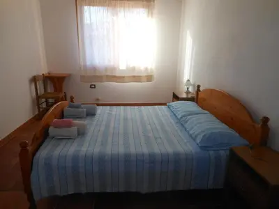 Letto o letti in una camera di La Tavernetta