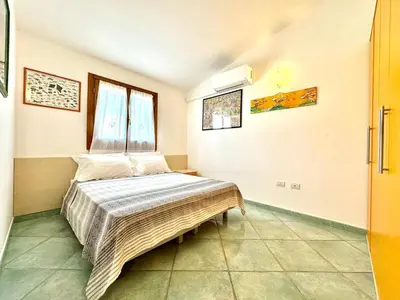 Letto o letti in una camera di Stardust Sea Apartments