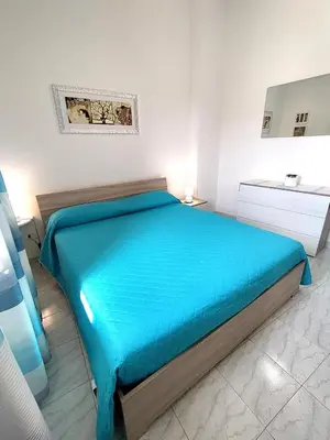 Letto o letti in una camera di Il Nido Azzurro