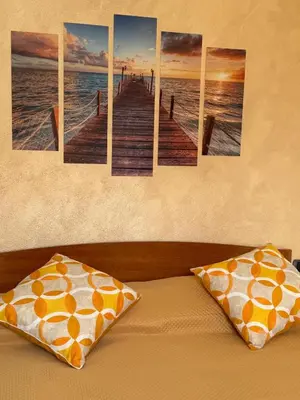 Letto o letti in una camera di Tramonto D'oro