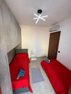 Letto o letti in una camera di Tramonto D'oro