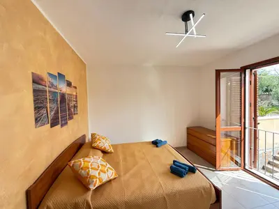 Letto o letti in una camera di Tramonto D'oro