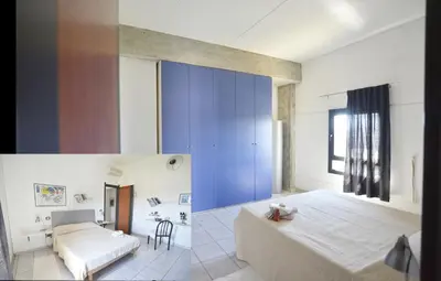 Letto o letti in una camera di Casa Vacanza Viale Arbatax