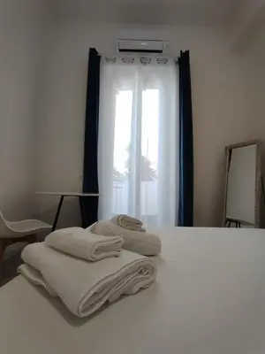 Letto o letti in una camera di Petite Deva - Central loft with balcony