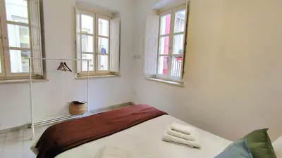 Letto o letti in una camera di Storico Centro Città
