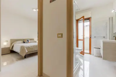 Letto o letti in una camera di GuestHost - Bright Apartment X4 with Terrace!
