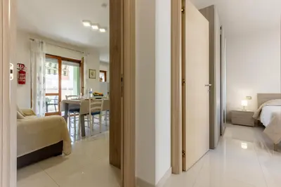 Letto o letti in una camera di GuestHost - Bright Apartment X4 with Terrace!