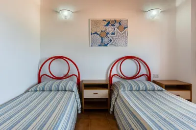Letto o letti in una camera di GuestHost - Sea's Peace