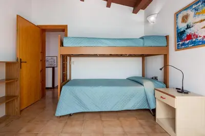 Letto o letti in una camera di GuestHost - Sea's Peace