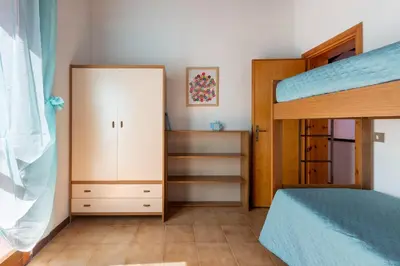 Letto o letti in una camera di GuestHost - Sea's Peace
