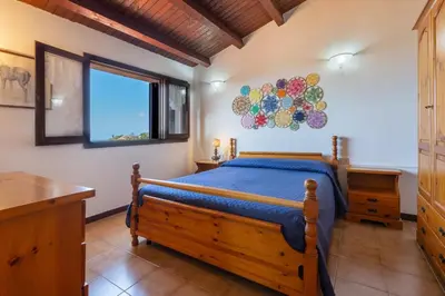 Letto o letti in una camera di GuestHost - Sea's Peace