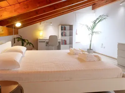 Letto o letti in una camera di Casa Zebio