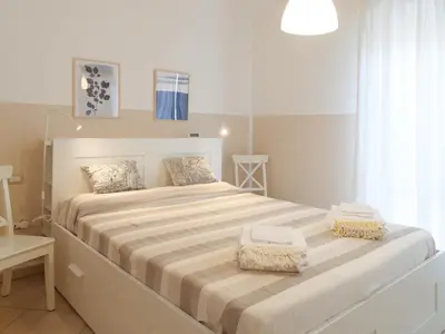 Letto o letti in una camera di Casa Zebio