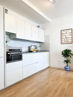 Cucina o angolo cottura di La Petite Maison Via Biasi - free parking - free wifi