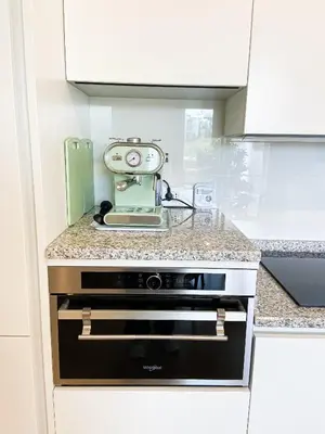 Cucina o angolo cottura di La Petite Maison Via Biasi - free parking - free wifi