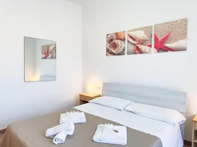 Letto o letti in una camera di Iside, a pochi passi dal centro