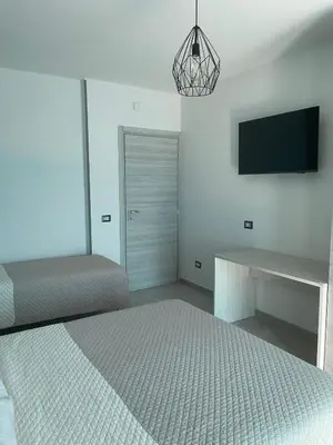 Letto o letti in una camera di Appartamento Numa Sardegna