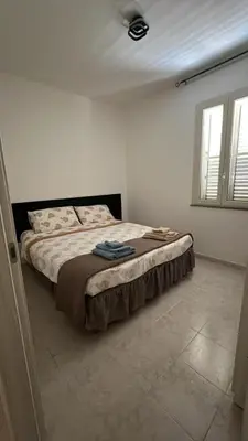 Letto o letti in una camera di La casa di Flo