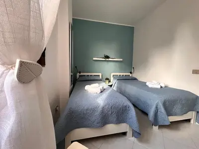 Letto o letti in una camera di Casa Sofia