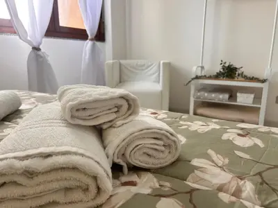 Letto o letti in una camera di Casa Sofia