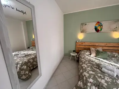 Letto o letti in una camera di Casa Sofia