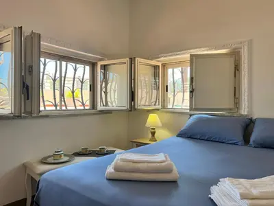 Letto o letti in una camera di House with terrace in Cagliari - Civico 5