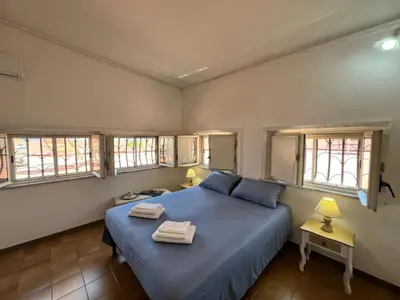 Letto o letti in una camera di House with terrace in Cagliari - Civico 5