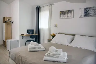 Letto o letti in una camera di Sa Perda Crocada