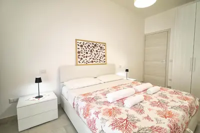 Letto o letti in una camera di Casa Marco