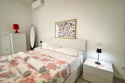 Letto o letti in una camera di Casa Marco