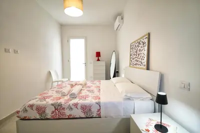 Letto o letti in una camera di Casa Marco