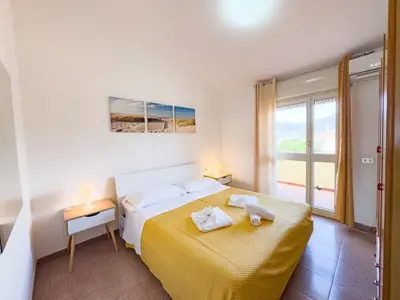 Letto o letti in una camera di Beatrice, ad un passo dal centro
