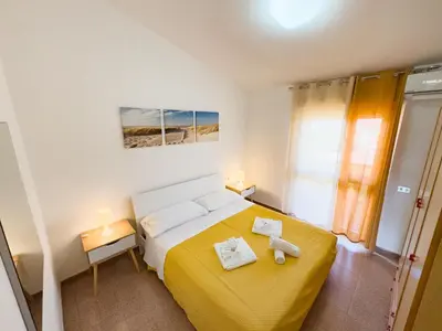 Letto o letti in una camera di Beatrice, ad un passo dal centro