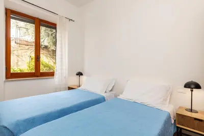 Letto o letti in una camera di Casa Davide