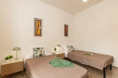 Letto o letti in una camera di Casa Davide