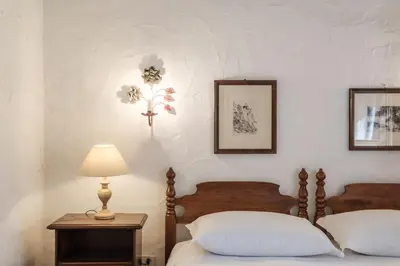 Letto o letti in una camera di Splendida villa nella natura a 200 m dal mare