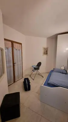Letto o letti in una camera di Ferienunterkunft in Costa Rei