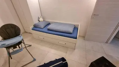 Letto o letti in una camera di Ferienunterkunft in Costa Rei