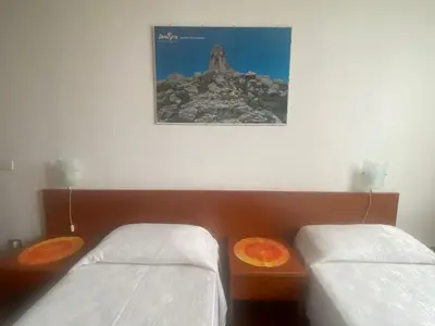 Letto o letti in una camera di Villa Patrizia sul Lago